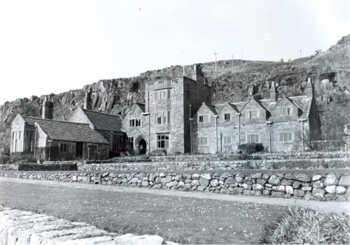 Front face of Little Cumbrae House and stepped lawn.
